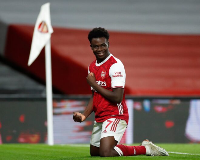 Bukayo Saka celebrating scoring