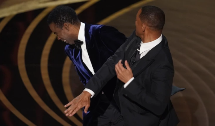 Will Smith punches comedian Chris Rock at 2022 Oscars