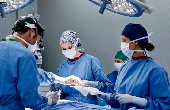 Medical doctors during surgery