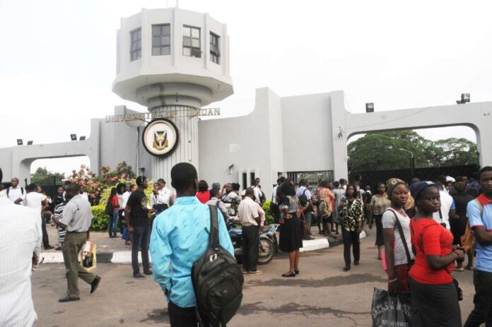 Even though the grass is not greener on the other side, UI students insist they must leave the country UI students in front of the school's gate