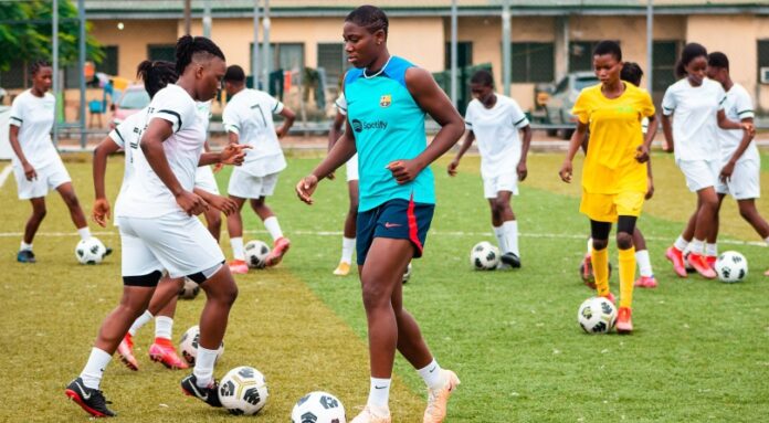 Asisat Oshoala trains with her academy players after receiving Guard of Honour
