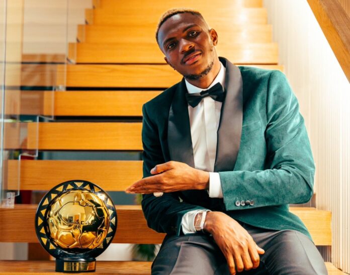 Victor Osimhen can’t get over his CAF award, revels in new photo Victor Osimhen can’t get over his CAF award, revels in new photo