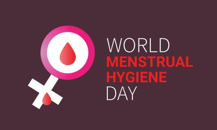 Menstrual Hygiene Day: What is it really about? The gender equality sign has a drop of blood in it with the caption of 'World Menstrual Hygiene Day' beside it.