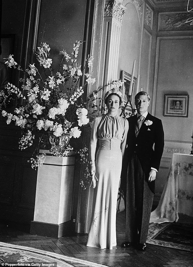 EDWARD VIII AND WALLS SIMPSON ON THEIR WEDDING DAY 
PHOTO CREDIT:- POPPERFOTO/ GETTY IMAGES 