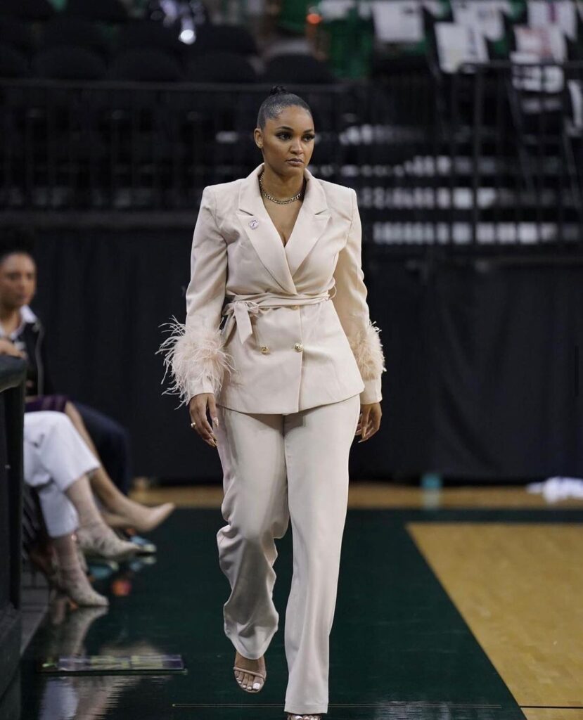 Sydney Carter in a feathery sleeved kimono and pants 
Credit:- Sydney Carter|Instagram