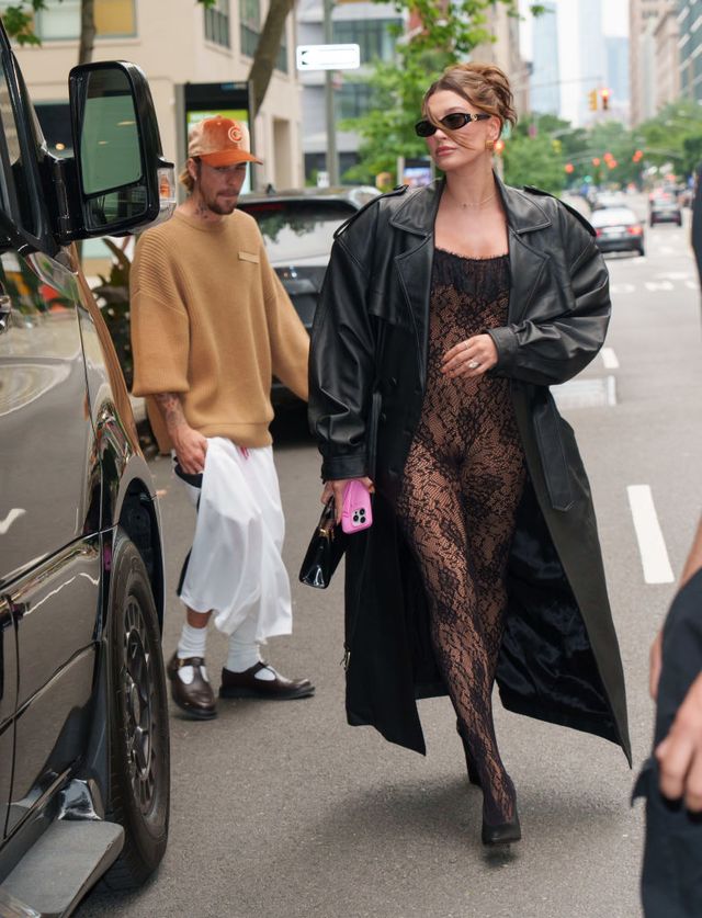 Hailey Bieber in a sheer cat suit alongside her husband, Justin Bieber