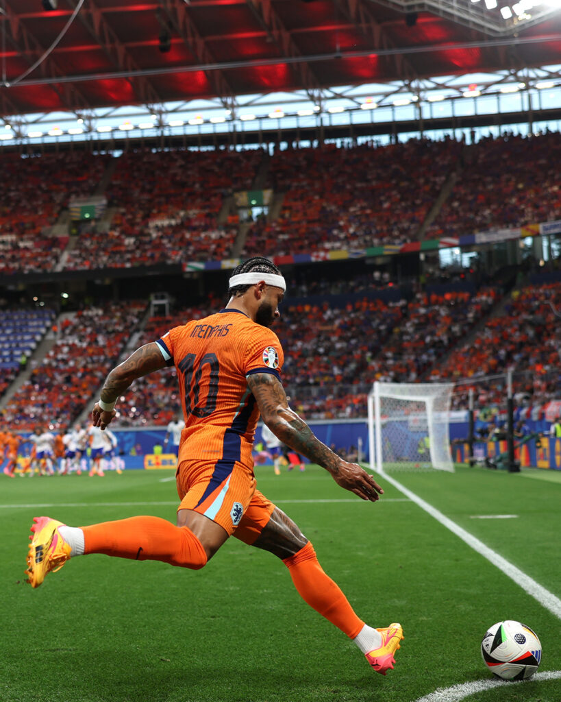 Memphis Depay takes the corner kick for the Dutch against France (Photo Credit: UEFA EURO)