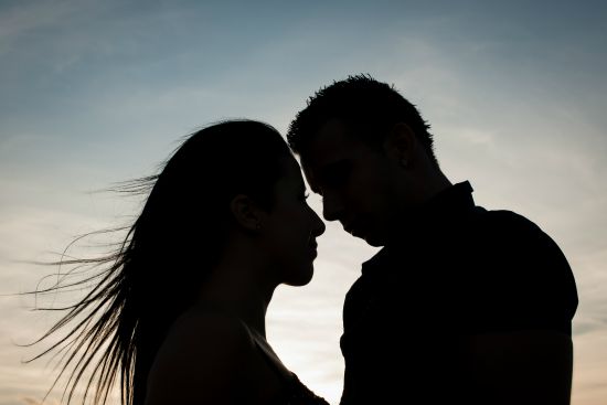 Teenage couple on a late summer afternoon in park