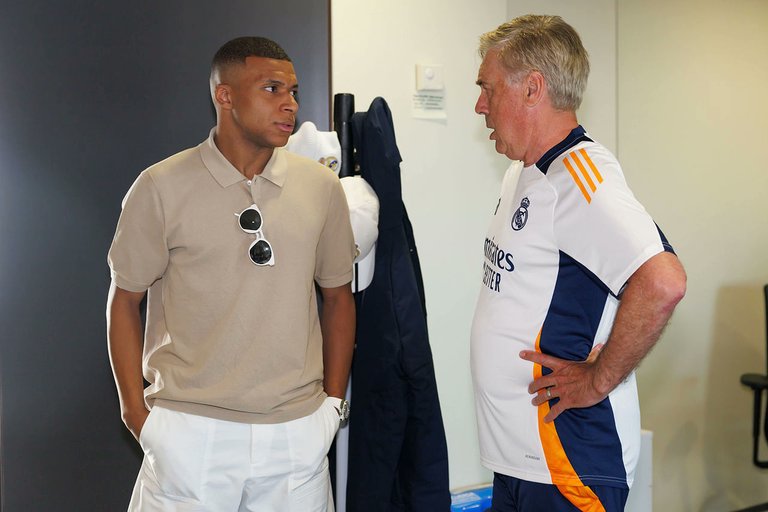 Mbappe alongside Real Madrid coach, Carlo Ancelotti