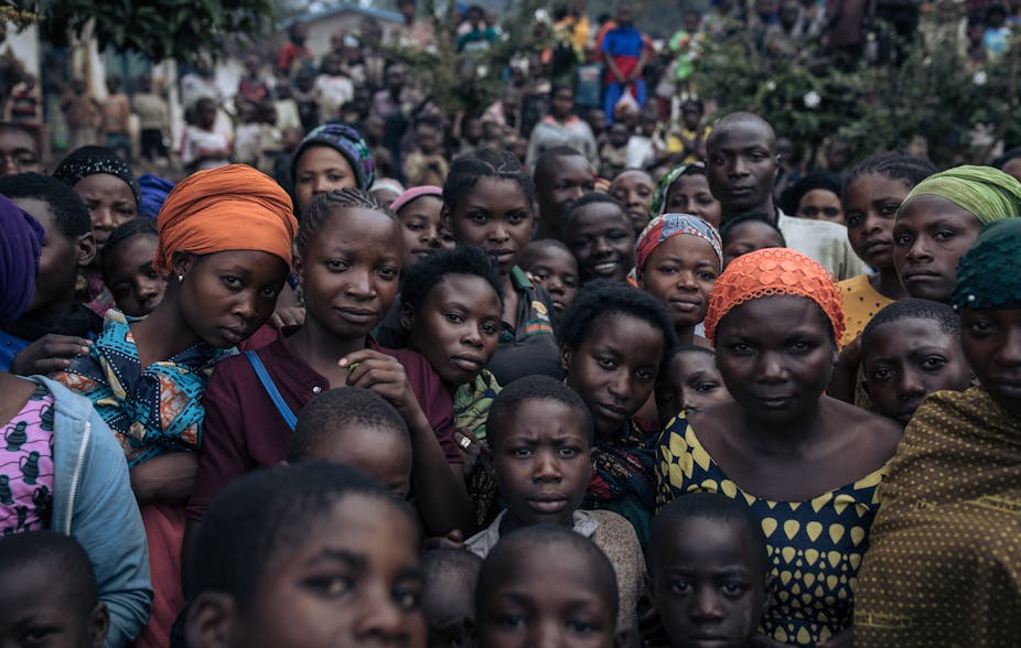 People displaced by war seek refuge at a school in Minova, South Kivu, eastern DRC. 
Photo Credit: Alex Huguet/AFP via Getty Images