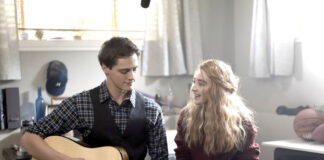 Tear-jerking romantic movies that you can watch on Valentine’s Day Clouds movie- A scene featuring Zach playing the guitar and Sammy admiring him