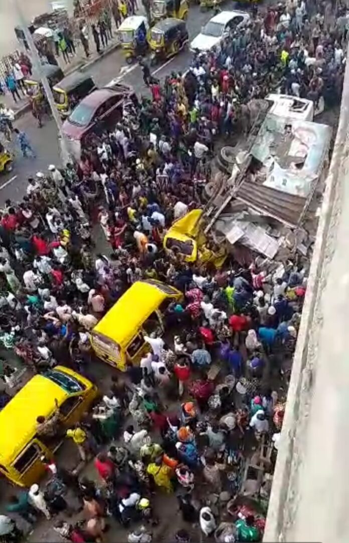 Driver injured as truck falls from Pen Cinema Bridge in Lagos Driver injured as truck falls from Pen Cinema Bridge in Lagos