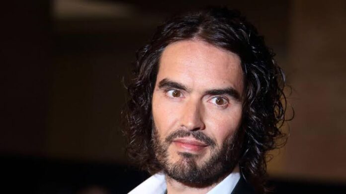 British comedian Russell Brand charged with rape, assault in UK