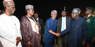 Tinubu returns to Abuja after 18-day visit to France, UK President Tinubu being received by top government officials at the Nnamdi Azikiwe International Airport, Abuja, at 9:50 p.m. on Monday. Photo: Channels