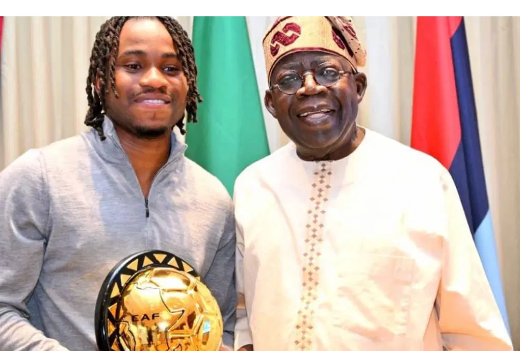 Ademola Lookman and Tinubu Ademola Lookman Presents CAF Player of the Year Award to President Tinubu in Lagos Visit