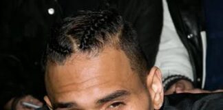 Chris Brown arrested over alleged attack on music producer Chris Brown