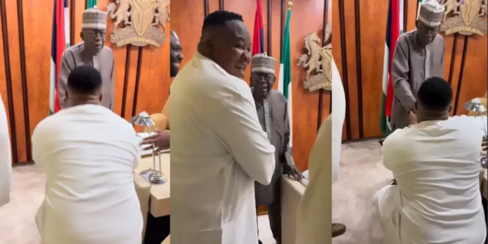 Cubana Chief Priest kneels before Tinubu, declares loyalty: “They can never break us” Cubana Chief Priest and Tinubu