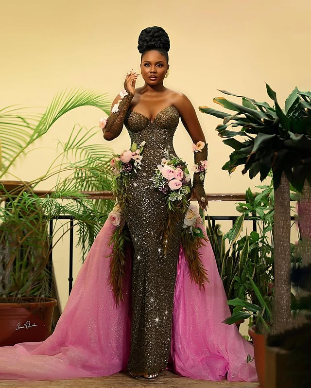 Jenni Frank in a pink rose inspired dress for the AMVCA2025