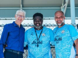 Arsenal Wenger alongside his former player at Arsenal Kolo Touré and Manchester City manager Guardiola.