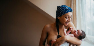 IVF/surrogacy: 5 joys of birthing your biological child in Nigeria mother holding a baby