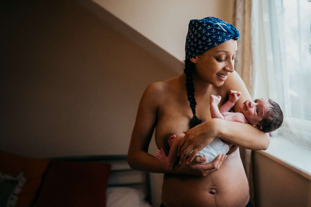 mother holding a baby mother holding a baby