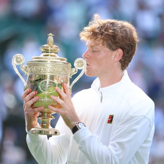 Jannik Sinner defeats Carlos Alcaraz to win the 2025 Wimbledon men's singles title.
