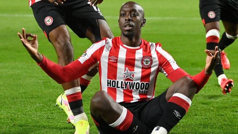Congolese forward Yohan Wissa has left Brentford's training base in Portugal as talks about his departure from the club intensify.