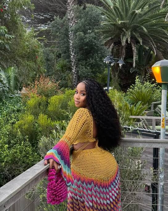 Veekee James in a crocheted two-piece