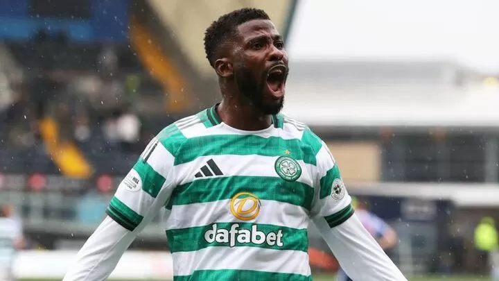 Kelechi Iheanacho scores a stoppage-time penalty on his Celtic debut, sealing a 2-1 win over Kilmarnock to keep their unbeaten run alive.