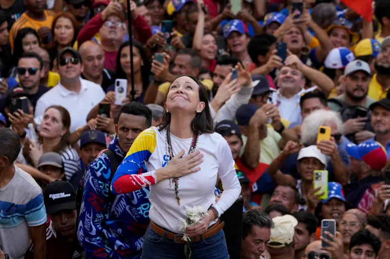 Venezuelan opposition leader Maria Corina Machado addresses supporters at a protest against President Nicolas Maduro in Caracas, Venezuela, Jan. 9, 2025 [Ariana Cubillos/AP]