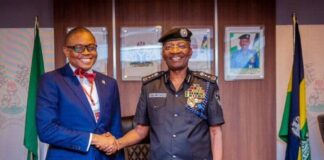 Police suspend enforcement of tinted glass permit pending court hearing L-R: NBA President Afam Osigwe and IGP Kayode Egbetokun