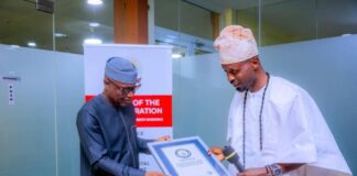 Oyebanji pledges continued investment in education as he honours GWR teacher Governor Biodun Oyebanji and Anifowose Oluwaseyi (PHOTO CREDIT: Ekiti State Government Facebook page)