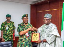 NOA Issa-Onilu and Navy officer