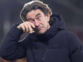 Thomas Frank was captured drinking from an Arsenal-branded cup during Tottenham's away loss to Bournemouth, which has gotten Spurs fans furious. (Image source: MSN)