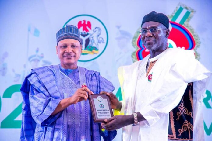 Minister of Information and National Orientation Mohammed Idris representing the FG to present awards to military personnel