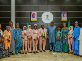 Kwara State Governor AbdulRahman AbdulRazaq with the students and others