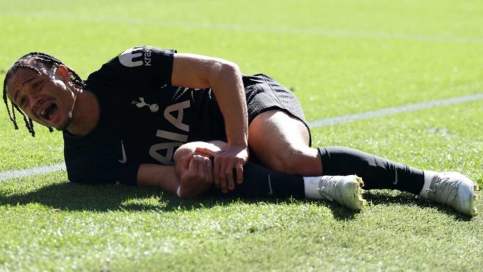Simons devastated as knee injury ends season and World Cup dream Dutch footballer Xavi Simons wriggles in pain after sustaining an injury during Spurs' game againt Wolves at the Molineux