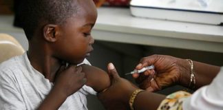 Lagos spends 5% of health budget on immunisation, but over 120,000 children remain unvaccinated A boy receiving vaccination