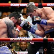 Usyk survives chaos as controversial stoppage sparks fury in Egypt 2 Verhoeven punches Usyk hard during their bout