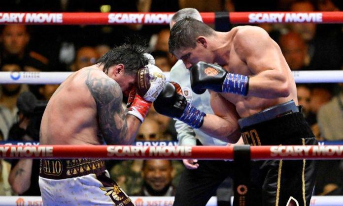 Usyk survives chaos as controversial stoppage sparks fury in Egypt Verhoeven punches Usyk hard during their bout