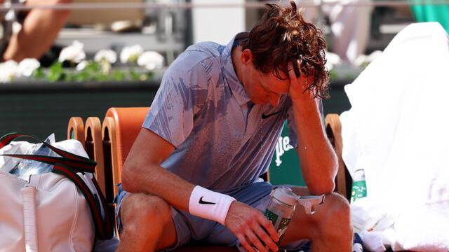 French Open: World number one Sinner stunned as heat and injury end Grand Slam dream Sinner struggled during his match against Cerundolo