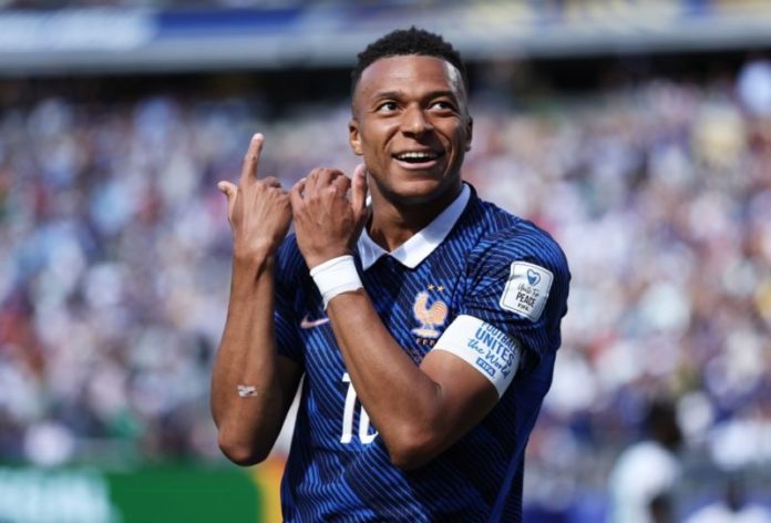 Mbappe makes history as France survive Senegal scare with clinical second-half surge Kylian Mbappe breaks France scoring record with brace as Les Bleus overcome Senegal in tense World Cup encounter (Image source: The Sun)